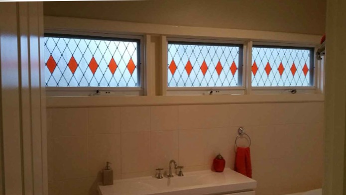 Film Installed: Solyx SX-1550 Frosted Lattice Black Grid with Solyx SXO-034 Orange Transparent Vinyl